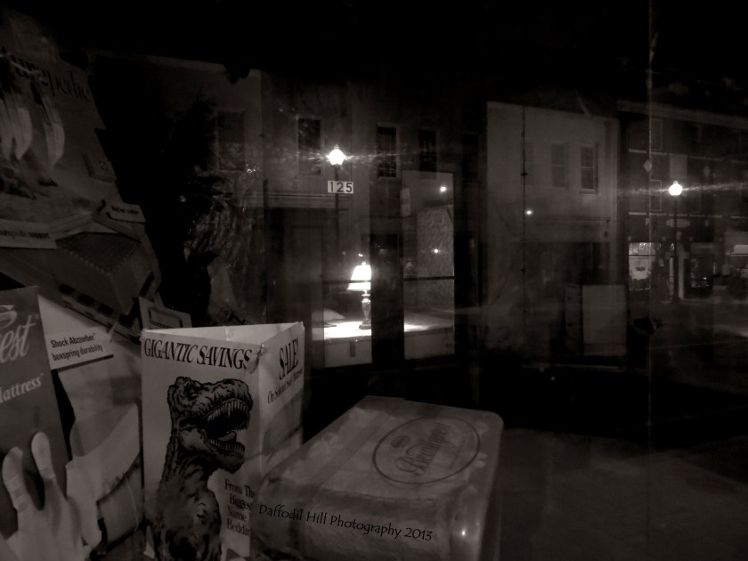 I was trying to capture the street behind me and the light in the door in front of me. Not great but I like it.